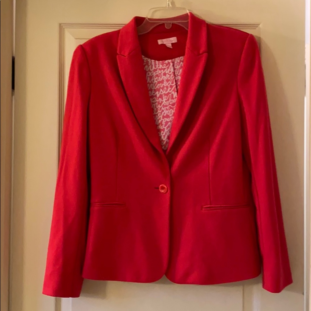 Lilly Pulitzer pink blazer.